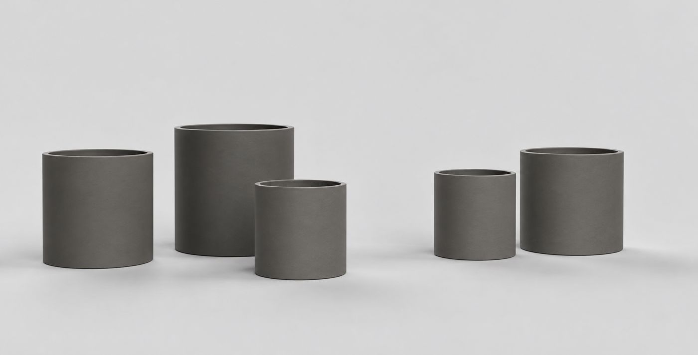 A set of stone grey pots